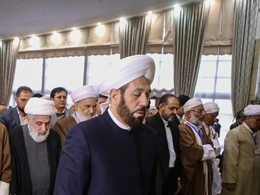 Who is "barrel bomb mufti" Ahmad Badreddin Hassoun, sentenced to prison for life for justifying Assad regime atrocities?
