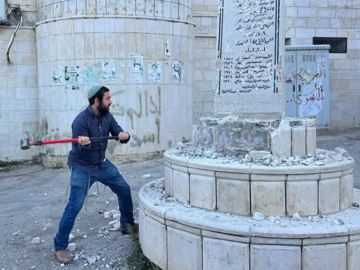 'Glorifies terrorism': Israeli far-right MP Zvi Sukkot smashes Palestinian memorial with sledgehammer | WATCH