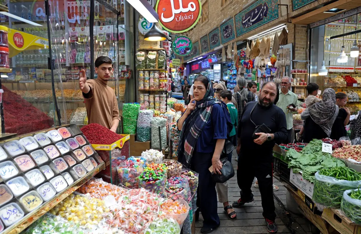 Iran feels the heat of fresh sanctions, Tehran says can withstand pressure
