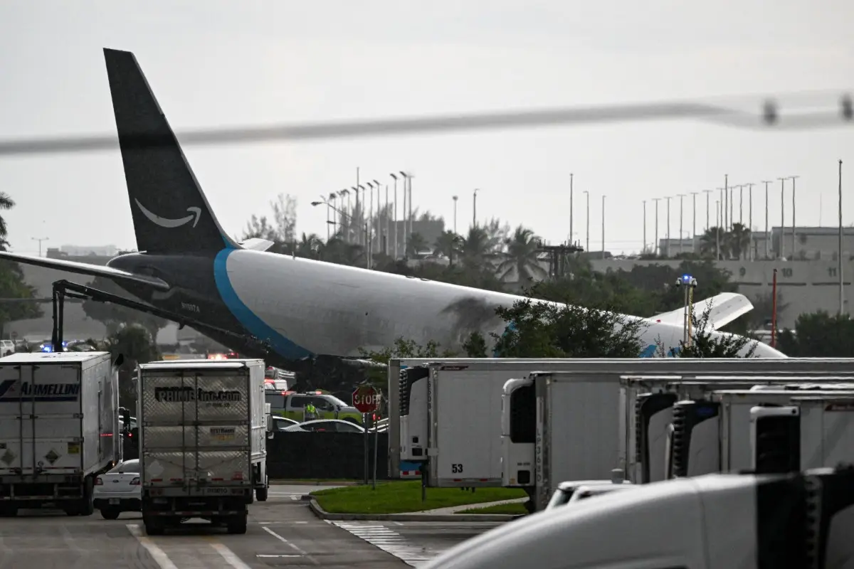 At least five killed after Amazon cargo plane runs off overruns runway at Miami airport