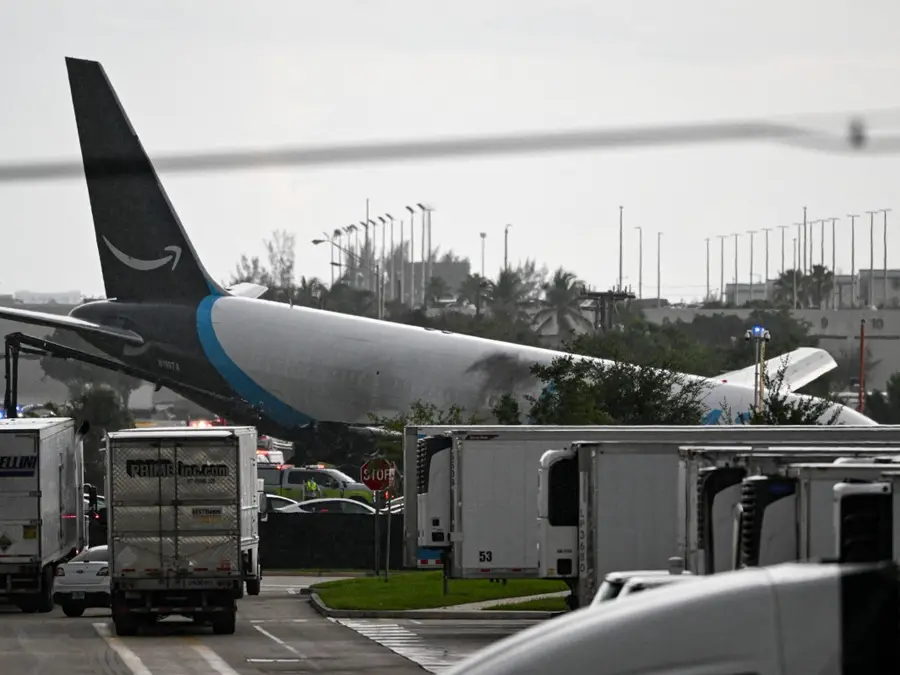 At least five killed after Amazon cargo plane runs off overruns runway at Miami airport