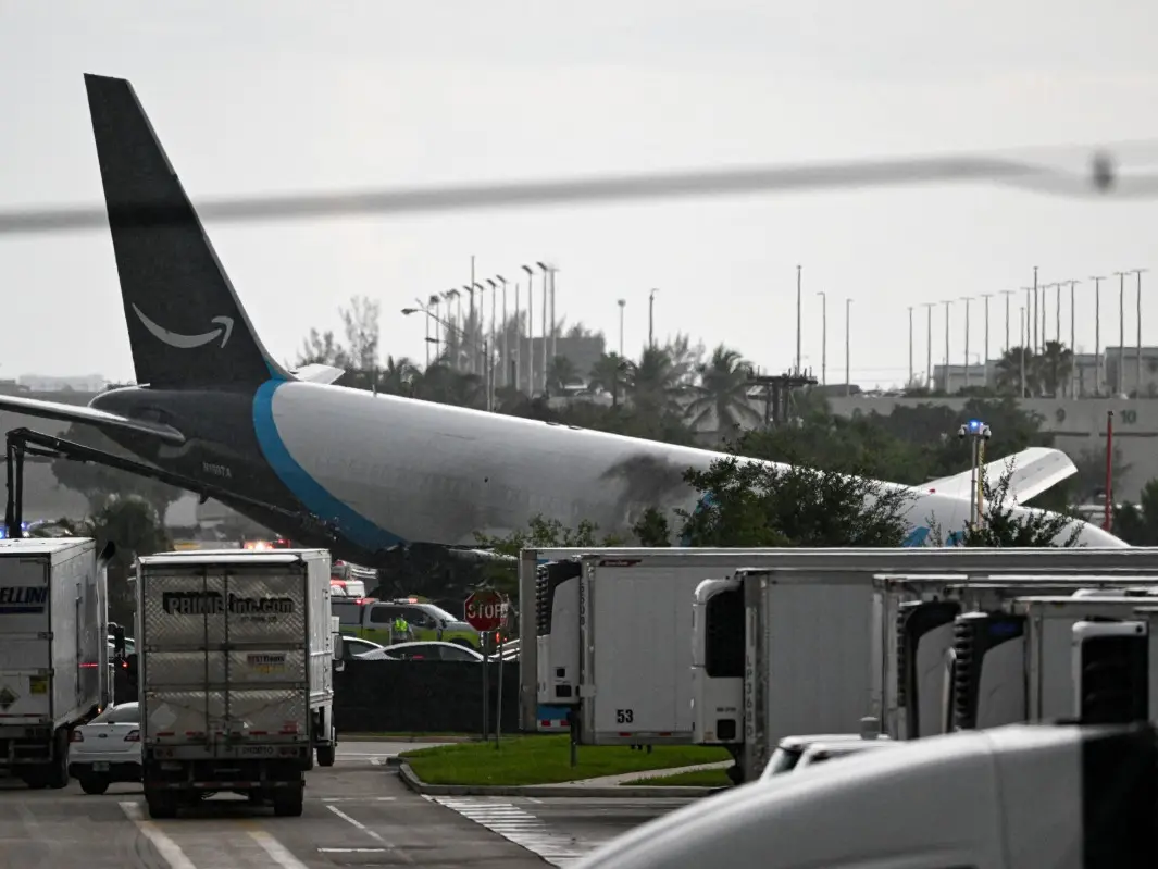 At least five killed after Amazon cargo plane runs off overruns runway at Miami airport At least five killed after Amazon cargo plane runs off overruns runway at Miami airport