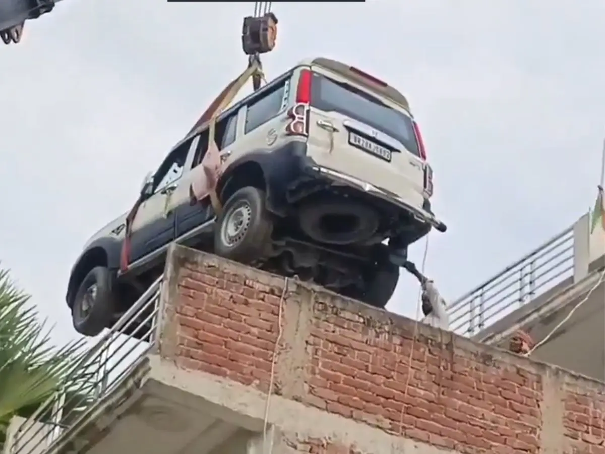 Watch | Bihar man lifts Mahindra Scorpio onto rooftop with crane to prevent theft