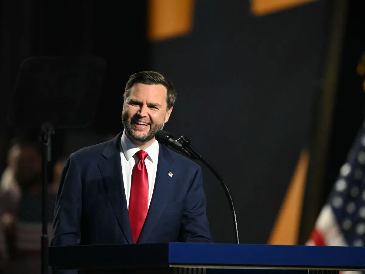 Chaos erupts at convention as protester waves Mexican and Palestinian flags during Vance address