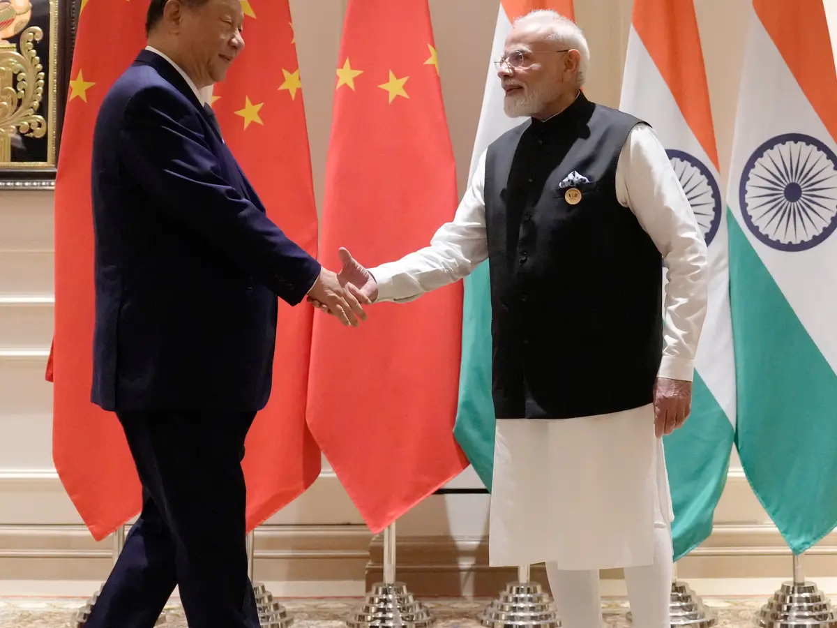 Xi and Modi Seek Stronger China-India Ties at BRICS Summit