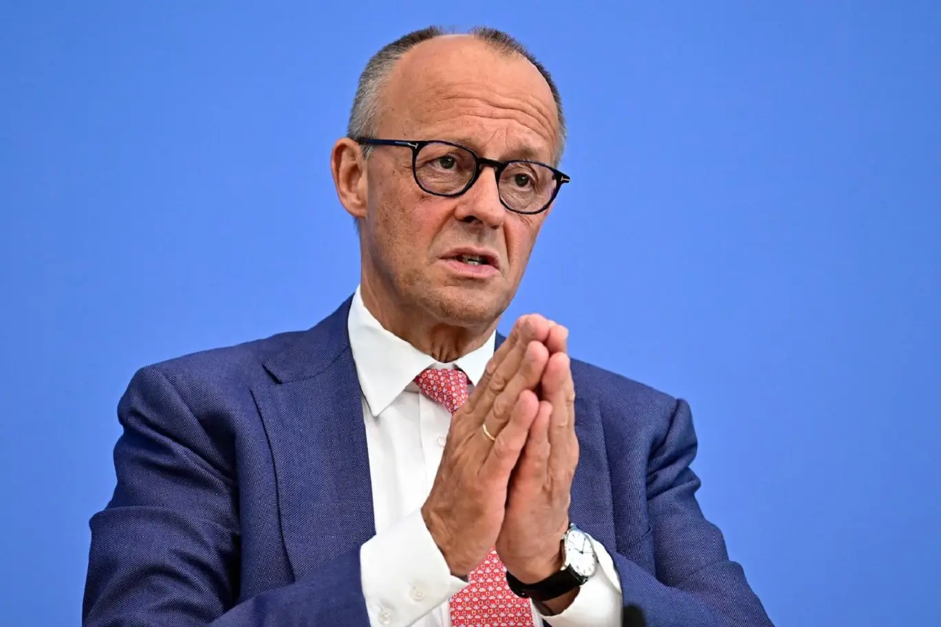 Chancellor Friedrich Merz vows to stay on as exit polls signal major poll setback