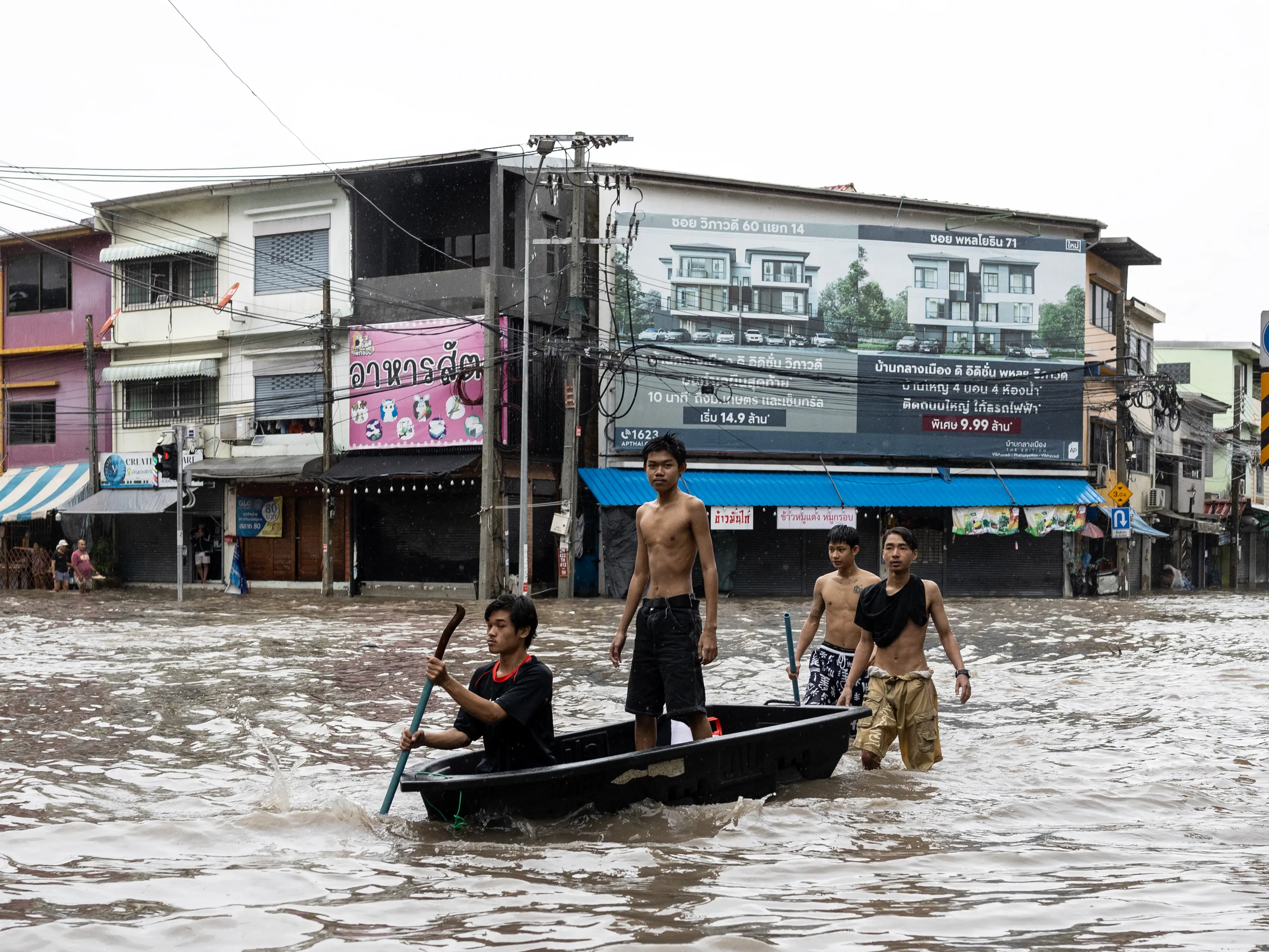 Bangkok declares flood disaster as heavy rain submerges roads and homes