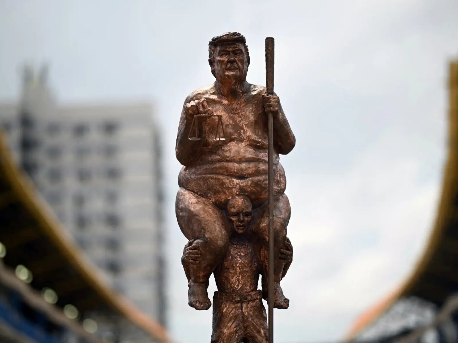 Trump's naked 23-karat gold statue unveiled near European Parliament