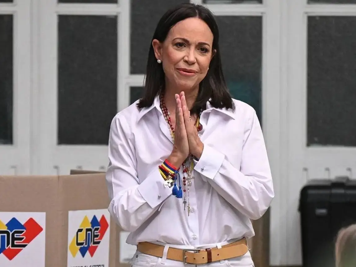 Venezuelan opposition leader María Machado returns home after over 10 months in exile